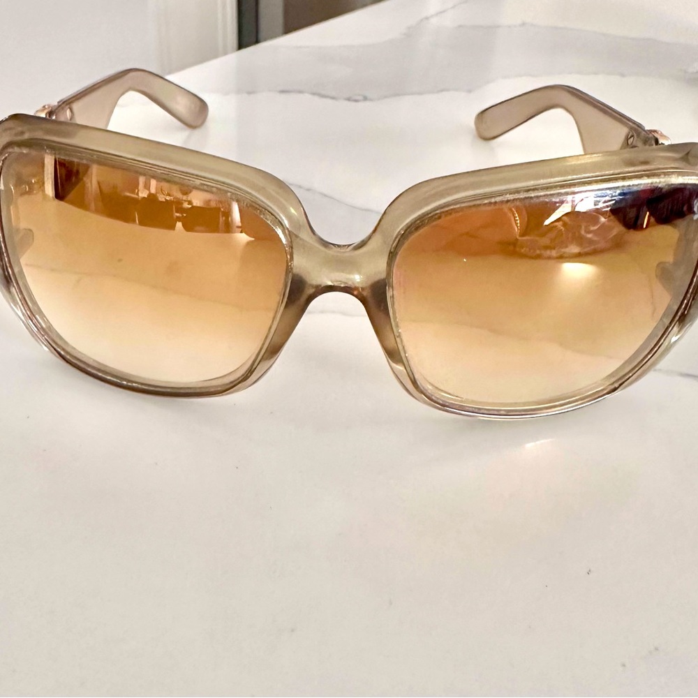 Gucci sunglasses.